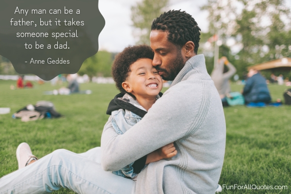 Father embracing his son outdoors, with quote overlay