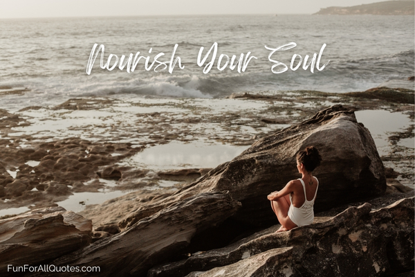 Woman sitting alone on rock along the sea, with quote overlay